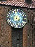 Horloge « du doigt de Dieu » à Toruń en Pologne.