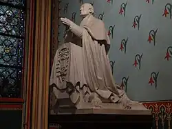 Détail de l'orant de Marie Dominique Auguste Sibour dans la cathédrale Notre-Dame de Paris.