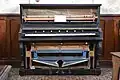 Piano harmonium vers 1900.