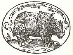 Dans l'emblème, le rhinocéros de Dürer est surmonté d'une légende « Non buelvo sin vencer », « Je ne reviendrai pas sans victoire ».