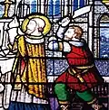 Détail d'un vitrail montrant l'assassinat de saint Bieuzy.