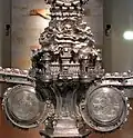 Golgotha et ville - Annonciation en deux médaillons