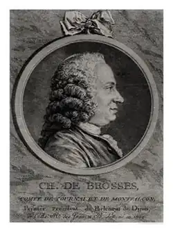 Profil d'homme dans un cartouche rond.