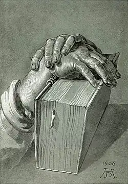 Albrecht Dürer, Étude de mains avec une Bible, 1506.