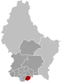 Carte du Luxembourg montrant les différents cantons, avec la ville de Dudelange mise en évidence en rouge dans le sud du pays.