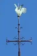 Le coq d'origine surmontant la croix.