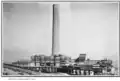 La cheminée en 1920, avec des filtres électrostatiques à sa base.