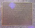 Plaque sous le buste de Pelé[3]