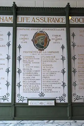 Plaque de marbre du hall d'entrée.