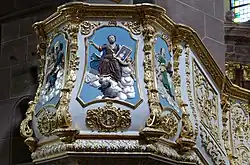 Kanzelkorb mit dem Relief des Evangelisten Lukas
