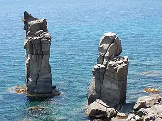 Colonne, „die Säulen“, Brandungspfeiler vor der Südspitze der Insel