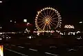 Hamburger Dom mit dem beleuchteten Riesenrad