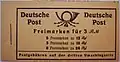 Das erste Nachkriegs-MH von 1947 (MH 50) mit seltenem Deckelverschnitt: Teil des Schriftzugs am Unterrand befindet sich am oberen Rand