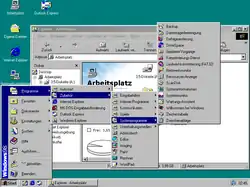 Der Explorer in Windows&nbsp;98; im Vordergrund das aufgeklappte Startmenü mit der Taskleiste (unten), dahinter der Dateiverwalter mit dem Spezialordner Arbeitsplatz (im Hauptfenster) und im Hintergrund der Desktop
