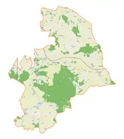 Mapa konturowa gminy Wieliczki, u góry nieco na prawo znajduje się punkt z opisem „Wojnasy”