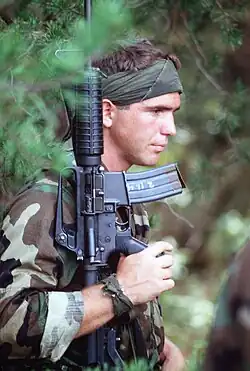 боец SEAL с Colt Commando (1 сентября 1987)