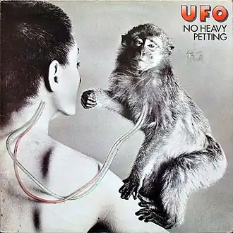 Обложка альбома UFO «No Heavy Petting» (1976)